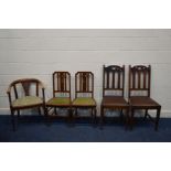 A PAIR OF EARLY 20TH CENTURY OAK ARTS AND CRAFTS CHAIRS, together with a pair of Edwardian chairs