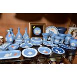 A GROUP OF WEDGWOOD JASPERWARES, to include dark blue vase and trinket dishes, light blue vases,