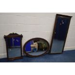 AN EARLY TO MID 20TH CENTURY OAK WALL MIRROR, with a wavy edge, 93cm x 67cm, together with a stained