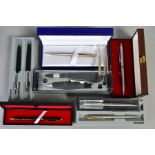 A SELECTION OF PENS, to include a boxed Parker set with ball point pen and pencil, a silver Parker