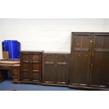 A MID 20TH CENTURY OAK TWO PIECE BEDROOM SUITE, comprising a double door wardrobe, width 126cm x