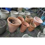 TEN MODERN TERRACOTTA PLANTER'S, the largest being 50cm in diameter and 49cm high