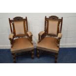 A PAIR OF EDWARDIAN OAK PARLOUR ARMCHAIRS, with brown upholstery