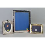 TWO MODERN SILVER MOUNTED PHOTOGRAPH FRAMES AND EPNS FRAME, the silver frames of Edwardian style,