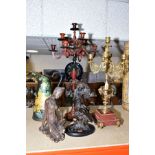 A GILT METAL AND MARBLE CANDELABRUM, the central column has an urn with rams head masks and swags