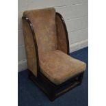 A MID 20TH CENTURY OAK WINGED CHAIR