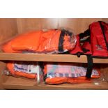 TWO BALTIC 150 WINNER AUTOMATIC INFLATING LIFE JACKETS, together with three crewsaver life