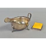 A GEORGE VI SILVER SAUCE BOAT, wavy rim, on three cabriole legs, makers Viners, Sheffield 1937,