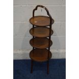 AN EDWARDIAN MAHOGANY FOUR TIER DISH TOPPED CAKE STAND, diameter 30cm x height 91cm