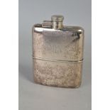 A GEORGE V SILVER HIP FLASK, of rectangular form, bayonet fitting hinged cover, engraved initials to