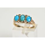 AN EARLY 20TH CENTURY THREE STONE RING, designed with three oval cut turquoise cabochons,