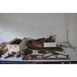 THREE BOXES OF VINTAGE HAND TOOLS including wooden planes, bow saw, a distressed wooden tripod,