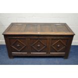 A GEORGIAN OAK TRIPLE PANEL COFFER, with foliate frieze above three diamond decorations to panels,