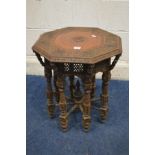 A HEAVILY CARVED ANGLO INDIAN WALNUT OCTAGONAL OCCASIONAL TABLE, with foliate detail to outer