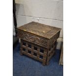 AN EARLY 20TH CENTURY CARVED OAK OCCASIONAL TABLE together with an Oriental folding table (sd)