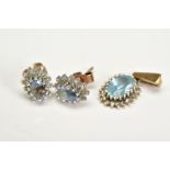 A PAIR OF TOPAZ EARRINGS AND MATCHING PENDANT, each earring designed with an oval cut blue topaz