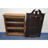 A GEORGIAN DARK OAK SINGLE DOOR HANGING CORNER CUPBOARD, together with a Victorian open bookcase (