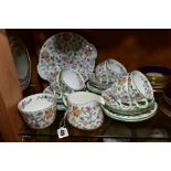 A MINTON HADDON HALL PATTERN TEASET, comprising milk jug, sugar bowl, a bread and butter plate,