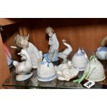 SIX LLADRO PORCELAIN FIGURES AND CHRISTMAS BELLS AND TWO NAO DUCK FIGURES, including bells dated