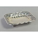 A MID 20TH CENTURY EGYPTIAN SILVER 900 STANDARD RECTANGULAR DISH, wavy rim, surrounding a border