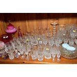 A QUANTITY OF CUT, PRESSED AND COLOURED GLASS to include vases, wine, sherry and port glasses,