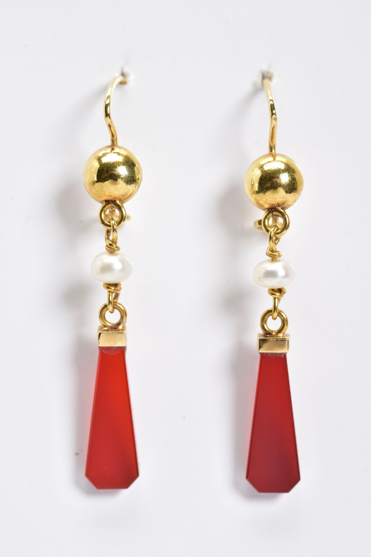 A PAIR OF CARNELIAN AND PEARL DROP EARRINGS, the yellow metal earrings each designed with a - Image 2 of 2