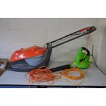 A FLYMO EASI GLIDE 300V LAWN MOWER and a Challenge garden blower (both PAT pass and working)