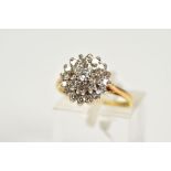 AN 18CT GOLD DIAMOND CLUSTER RING, the tiered cluster set with a central round brilliant cut diamond