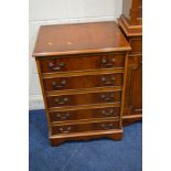 A MODERN YEWWOOD GLAZED DOUBLE DOOR BOOKCASE with two drawers, width 92cm x depth 32cm x height