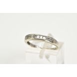 A 9CT WHITE GOLD DIAMOND HALF HOOP RING, set with ten princess cut diamonds in a rub over setting,