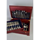 A MODERN MAHOGANY FINISH CANTEEN CONTAINING AN ASSORTMENT OF KINGS PATTERN CUTLERY, with varying