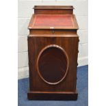 A VICTORIAN MAHOGANY DAVENPORT, with a tooled oxblood leather insert, hinged pen tray to top,