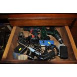 THE CONTENTS OF A DRAWER FULL OF POWER TOOLS, including a Dremel Engraver, a Wickes Cordless drill