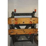 A BLACK AND DECKER WORKMATE AND A DISASSEMBLED FOUR WHEELED TROLLEY, with Pnuematic tyres 112cm long
