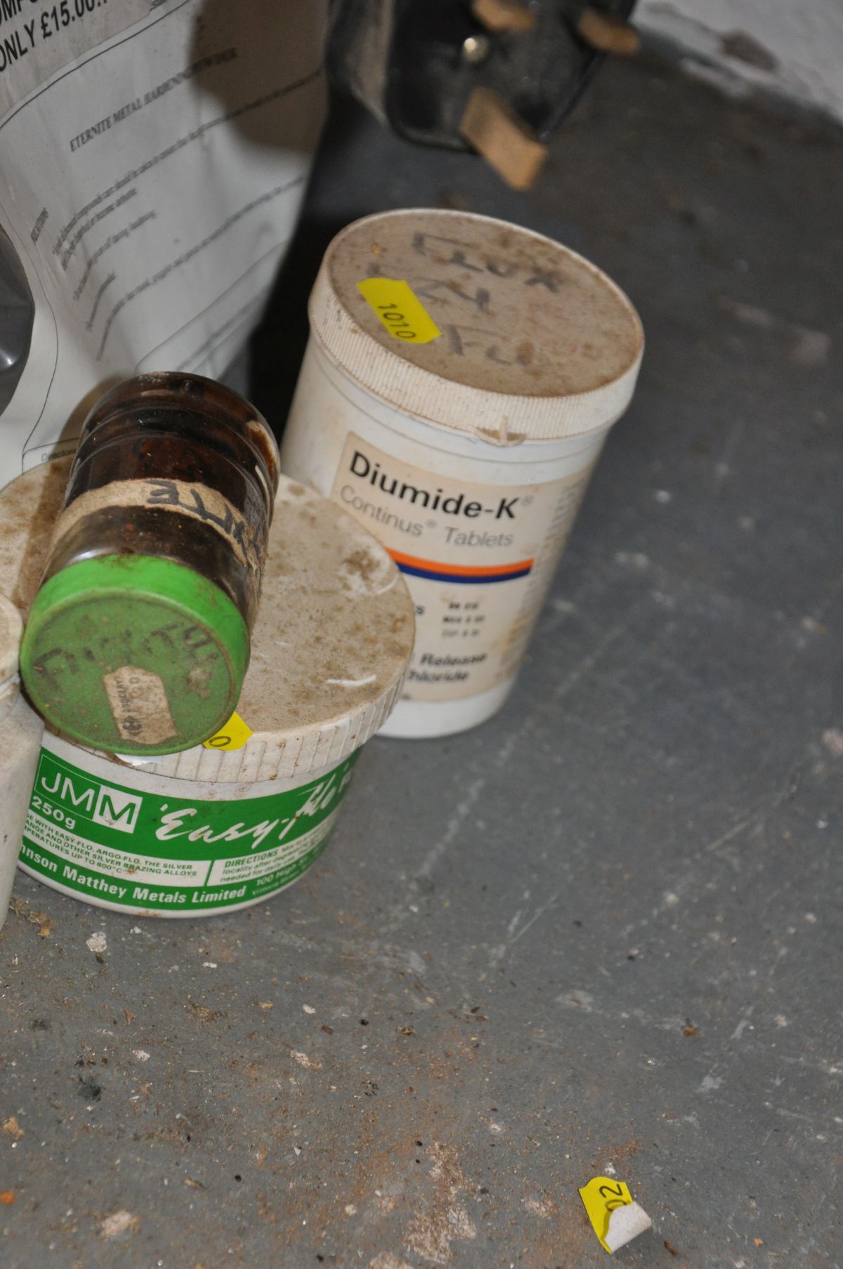 A QUANTITY OF METAL WORKING POWDERS AND PASTES, including a tub of Plas-Dent Novocast, a bag of case - Image 3 of 4