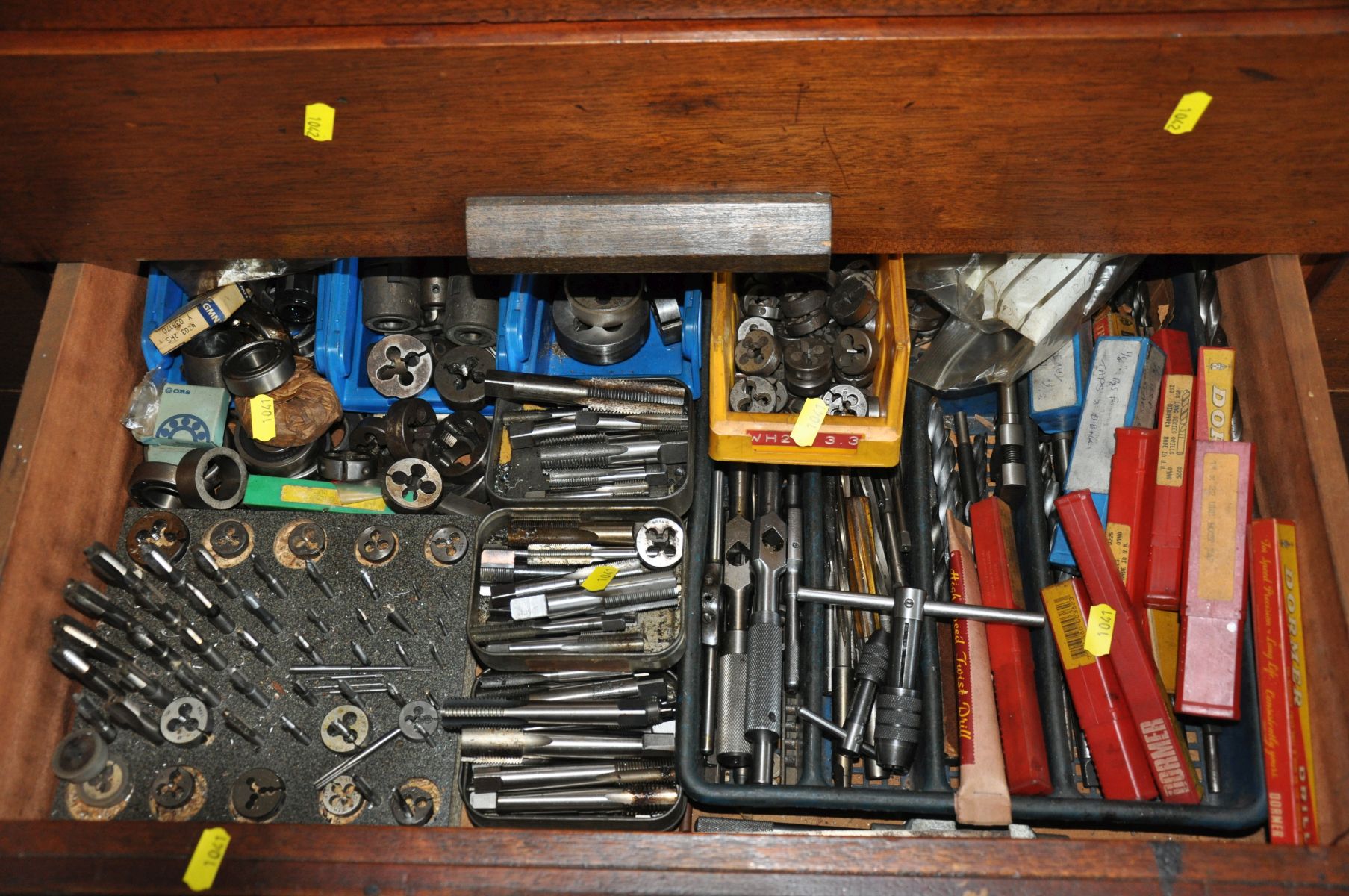 THE CONTENTS OF TWO DRAWERS, containing a large quantity of Taper shank and normal drill, taps, dies