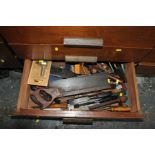 THE CONTENTS OF A DRAWER, containing woodworking tools including a Stanley Rabbet Plane, a spoke