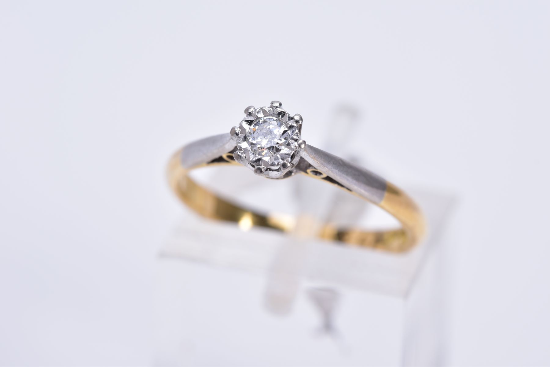 A DIAMOND SINGLE STONE RING, a modern round brilliant cut diamond estimated weight approximately 0.