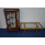 A WALNUT SINGLE DOOR CHINA CABINET with two fixed shelves together with a Nathan teak coffee