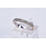 AN 18CT WHITE GOLD DIAMOND RING, a half hoop design set with two rows of claw set round brilliant