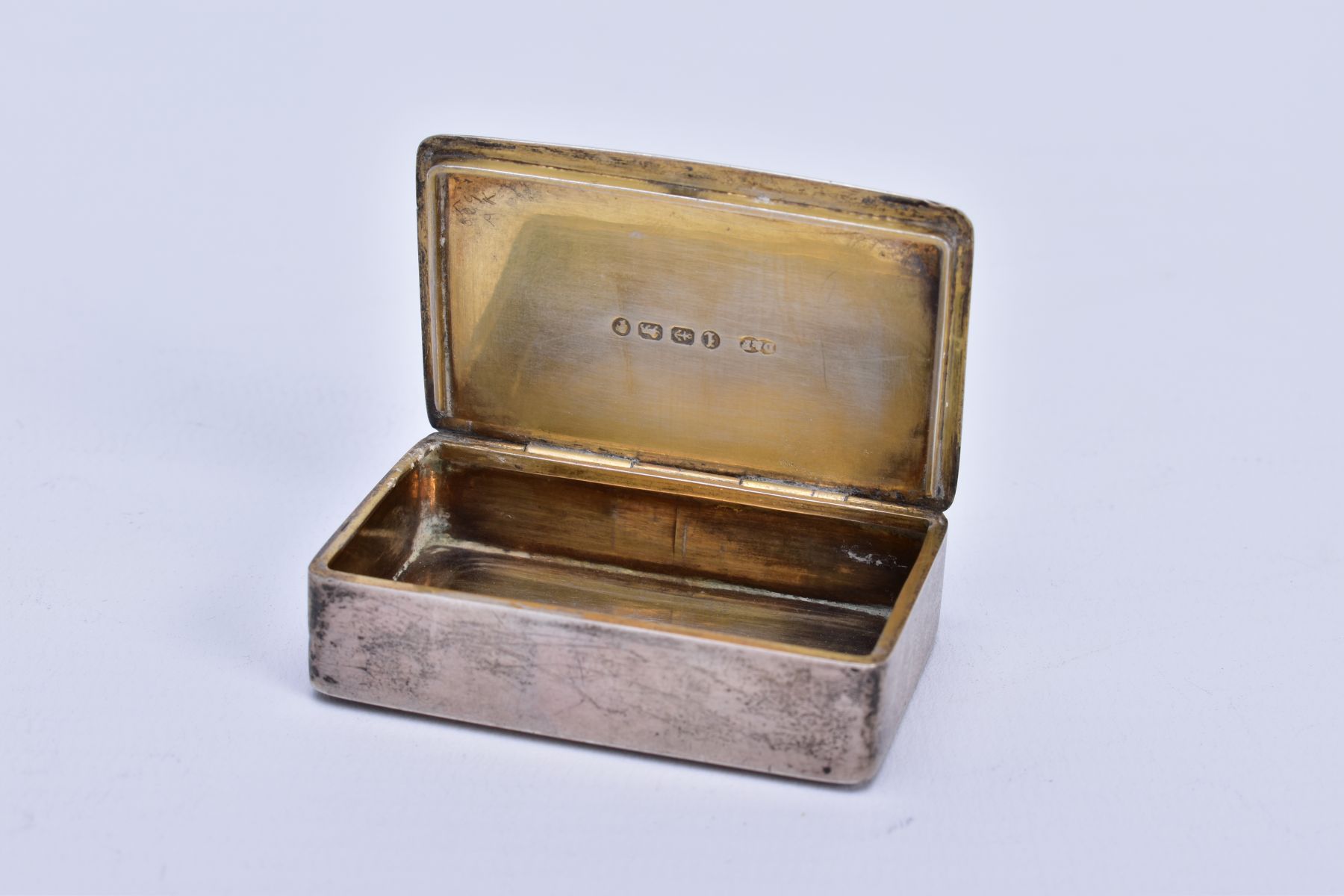 A VICTORIAN SILVER SNUFF BOX, measuring approximately 50mm x 32mm, a plain case with engraved - Image 3 of 3