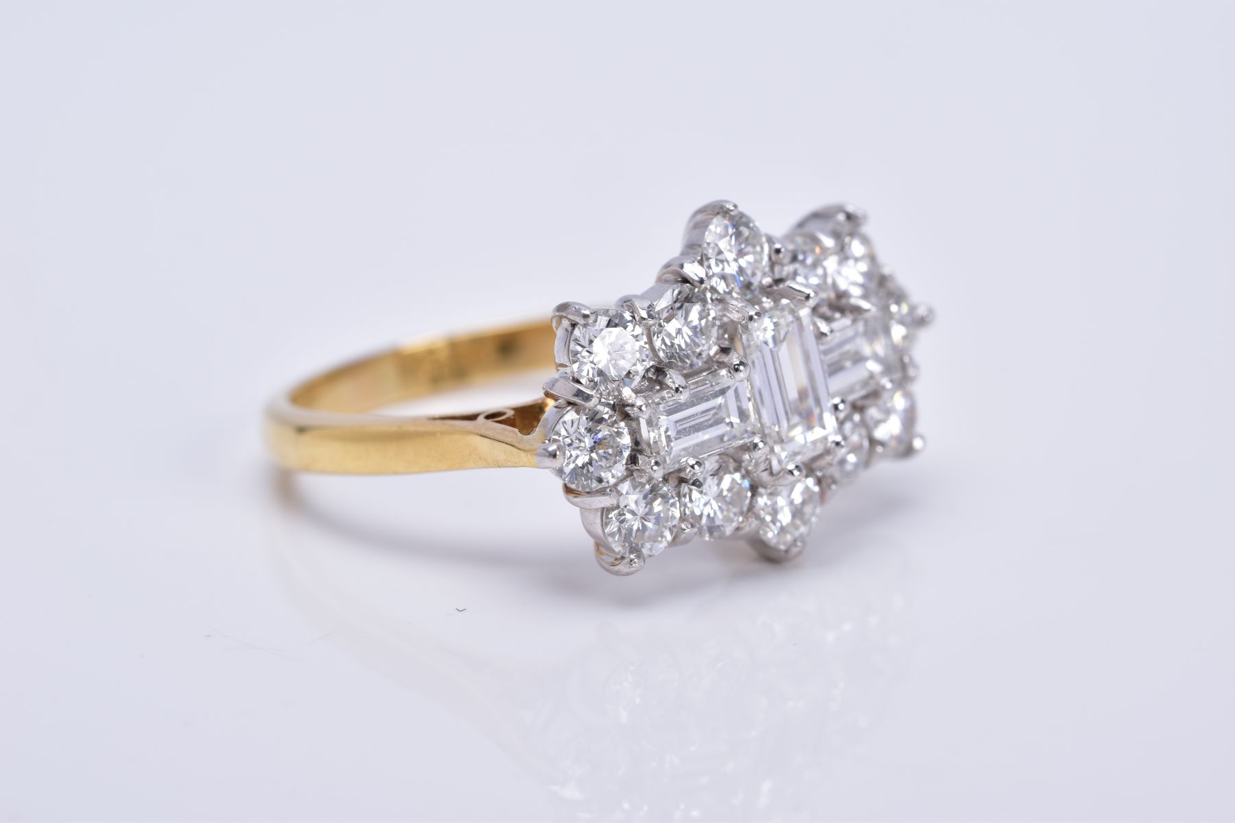 A MODERN 18CT GOLD LARGE DIAMOND CLUSTER RING, comprised three rap cut diamonds, measuring - Image 5 of 6