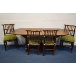 A SET OF FOUR EARLY 20TH CENTURY OAK RUSH SEATED SPINDLE BACK CHAIRS, with cushion pads, together