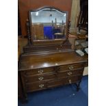 AN EARLY TO MID 20TH CENTURY OAK DRESSING CHEST, with a single mirror and four drawers, width