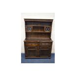 A MID 20TH CENTURY OAK DRESSER with two drawers, width 126cm x depth 48cm x height 182cm