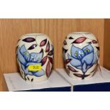 A PAIR OF BOXED MOORCROFT BALUSTER VASES, decorated in Jacobs ladder pattern on a cream ground,