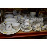 A WEDGWOOD COTTAGE ROSE PATTERN DINNER SERVICE, comprising meat platter, three twin handled