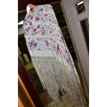 A CHINESE HAND EMBROIDERED CREAM SILK PIANO SHAWL, measuring approximately 130cm square, excluding