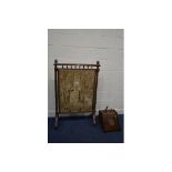 A LARGE EARLY 20TH CENTURY OAK FIRE SCREEN, with lion head's to top rail, turned and fluted