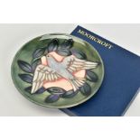A MOORCROFT POTTERY 1993 YEAR PLATE, 'Dove' Trial pattern, impressed backstamp and marked 'TRIAL' to